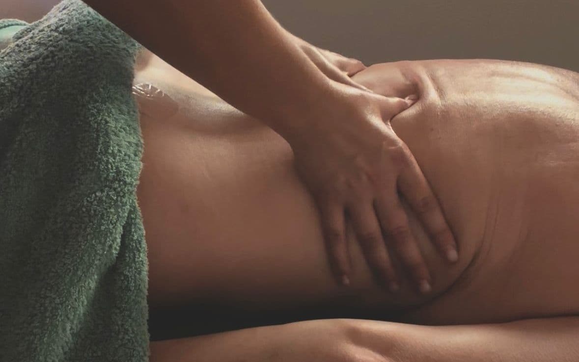 Warm massage therapy setting
